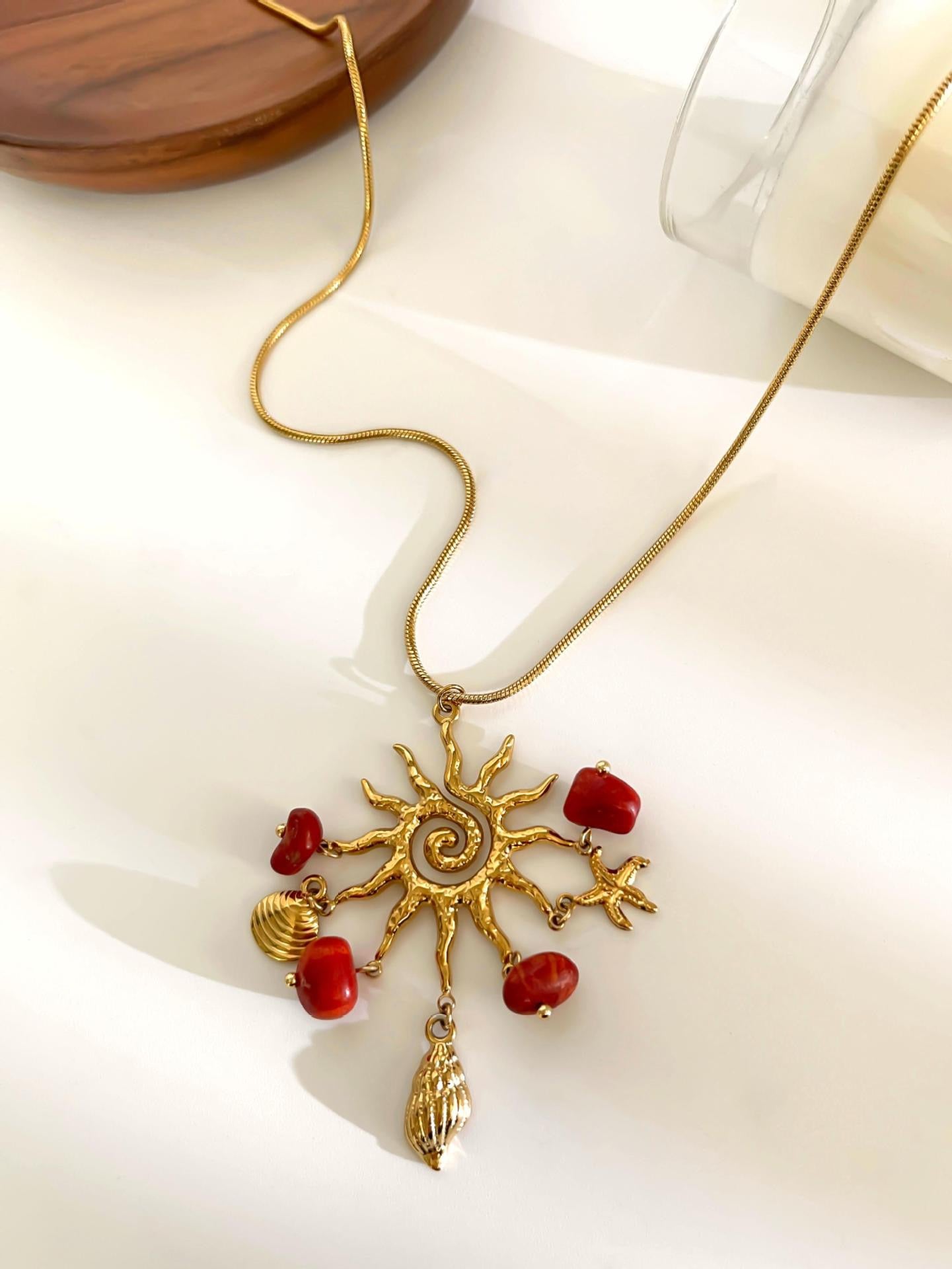 Red sun charm necklace