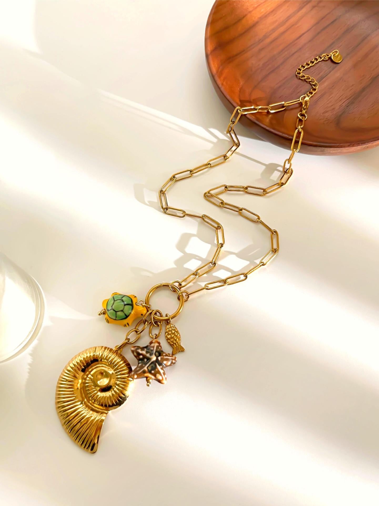 Yellow turtle shell charm necklace