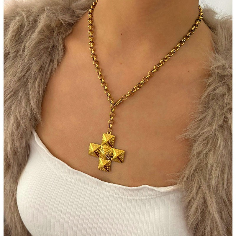 Swirl cross necklace