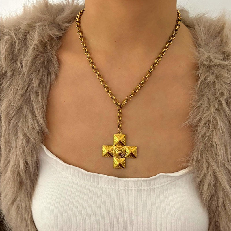 Swirl cross necklace
