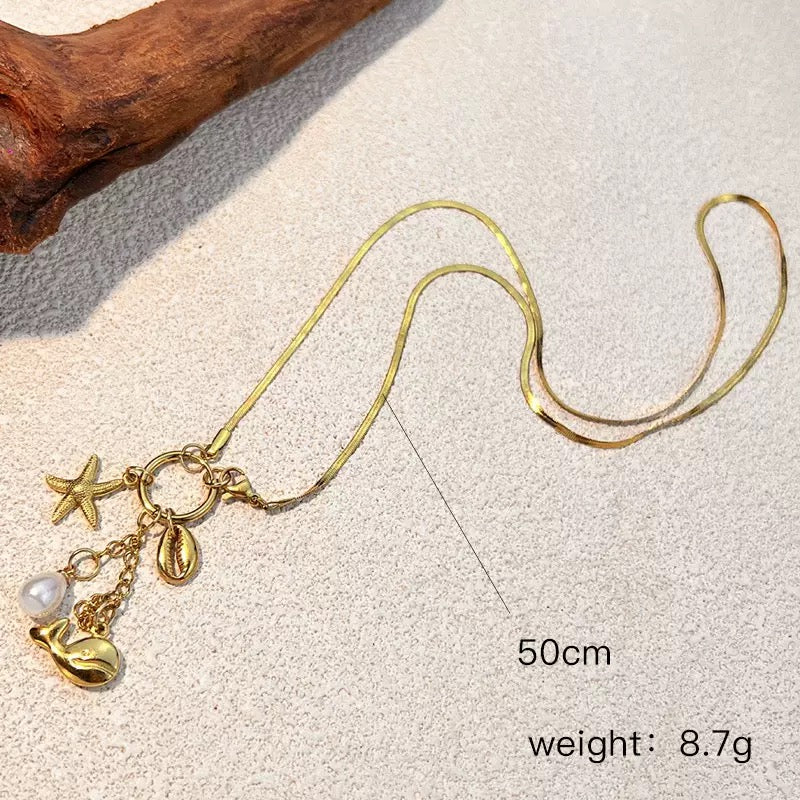 Dolphin charm necklace