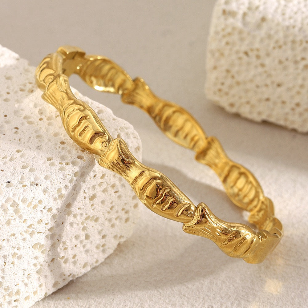 Gold fish bangle