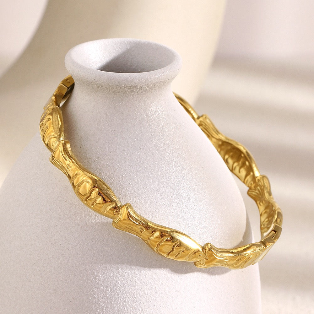 Gold fish bangle