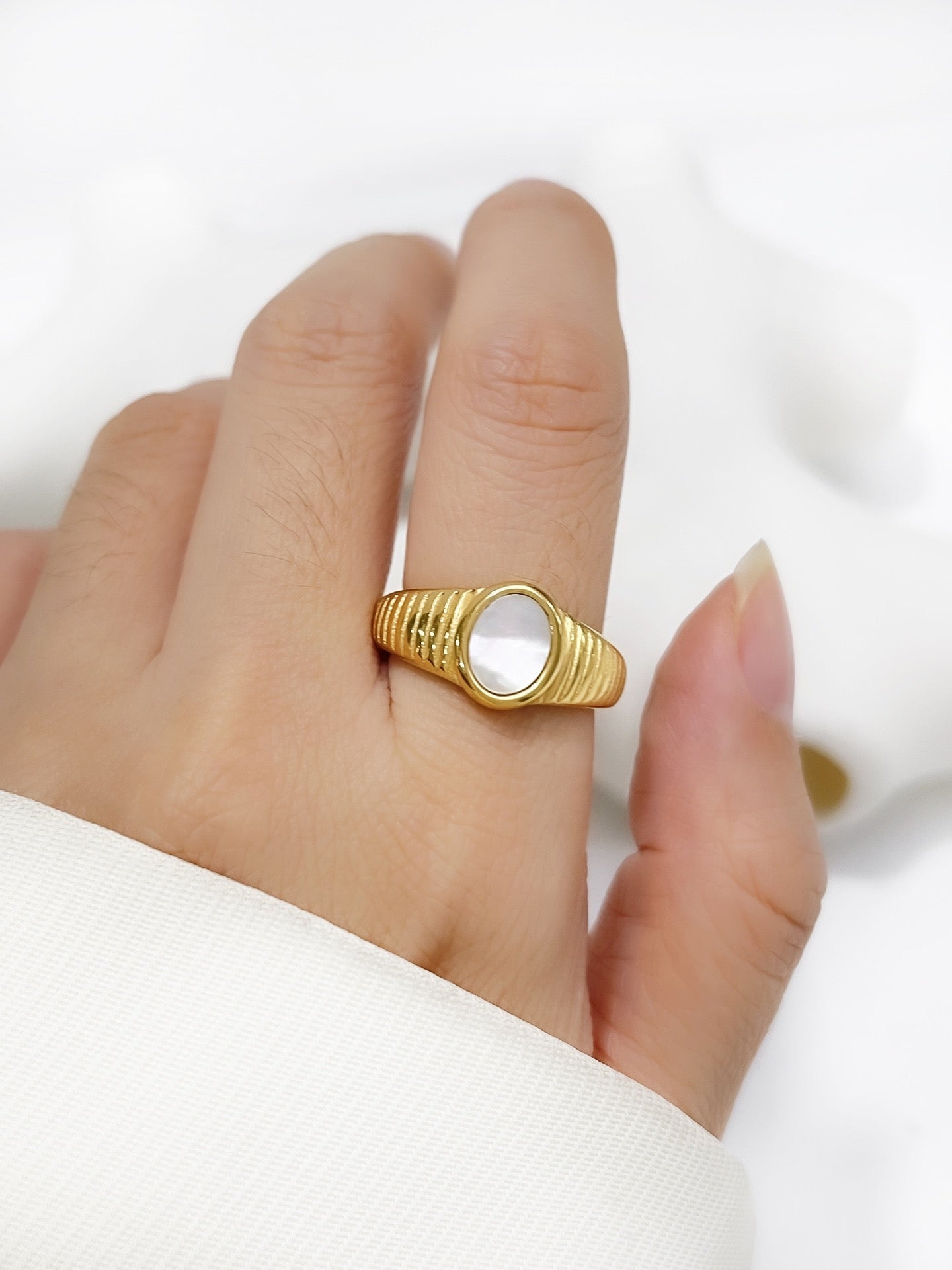 White mother of pearl ring