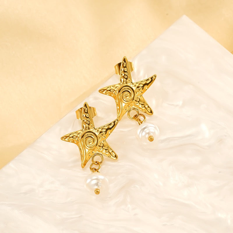 Shea Swirl star earrings