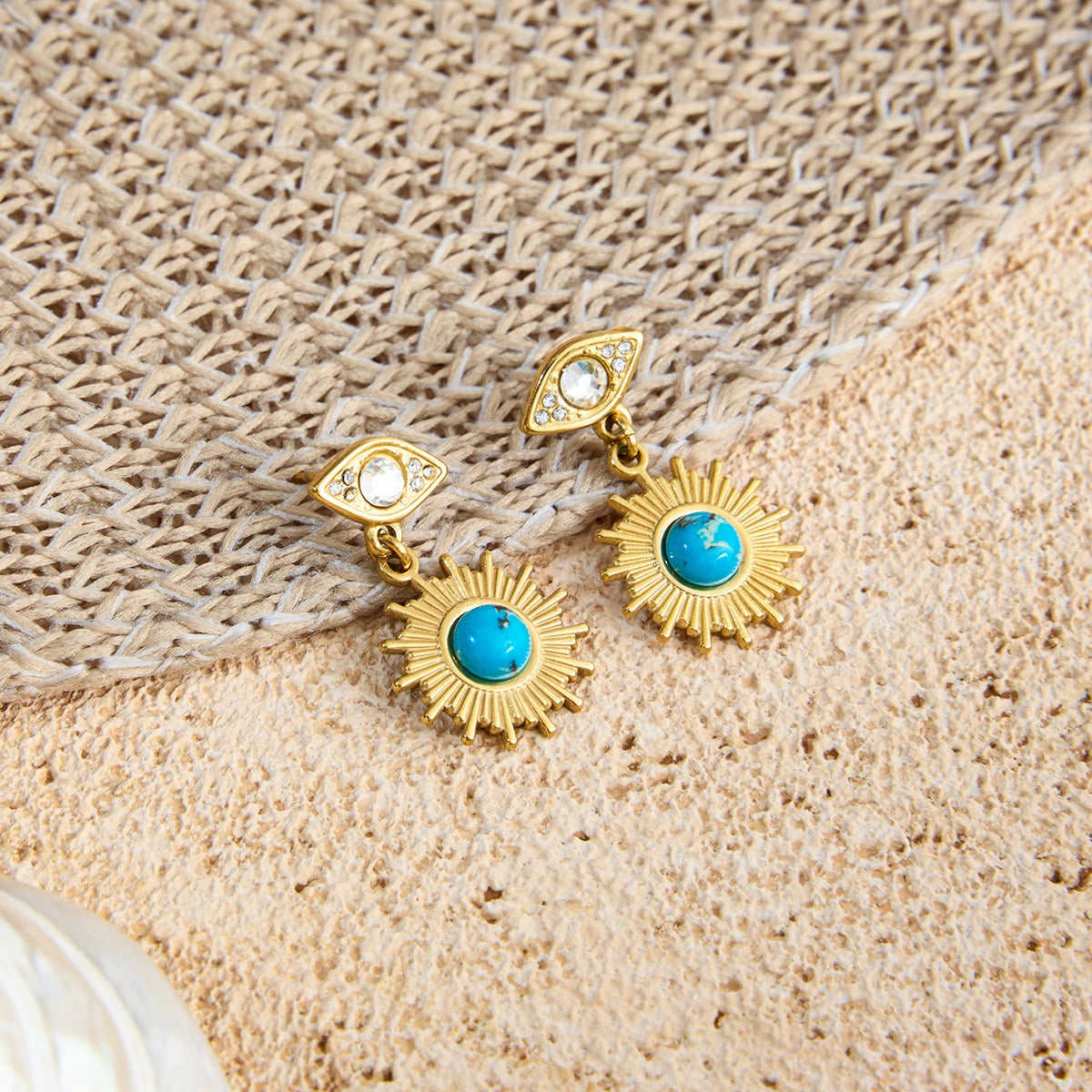 Blue eye earrings