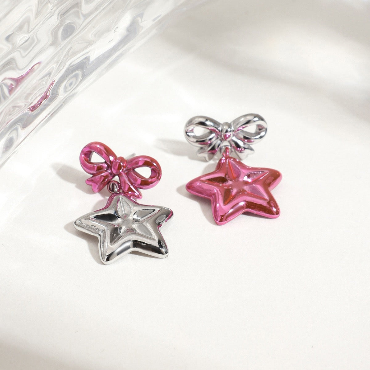M2M pink star earrings