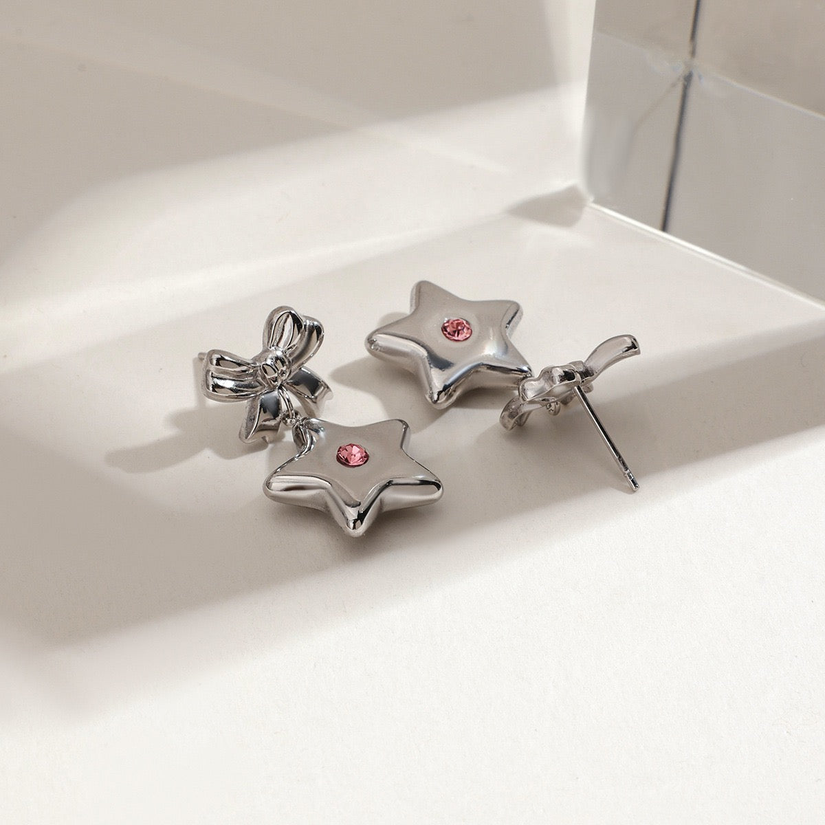 Star bow earrings
