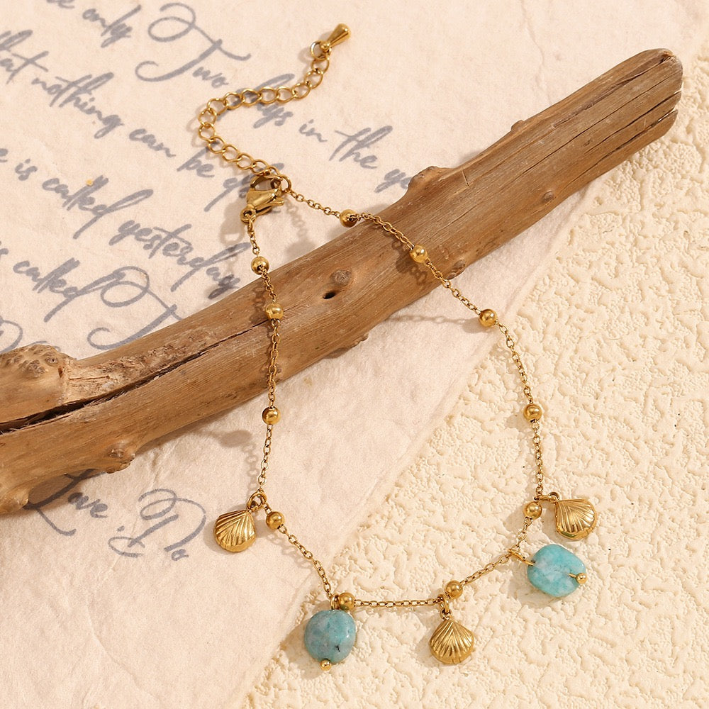 Blue shell charm bracelet