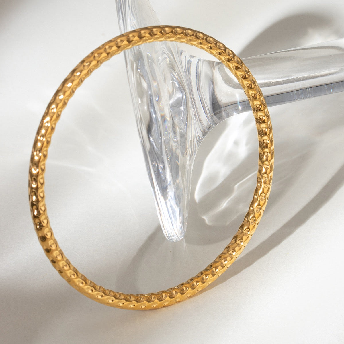 Hammer hoop bangle