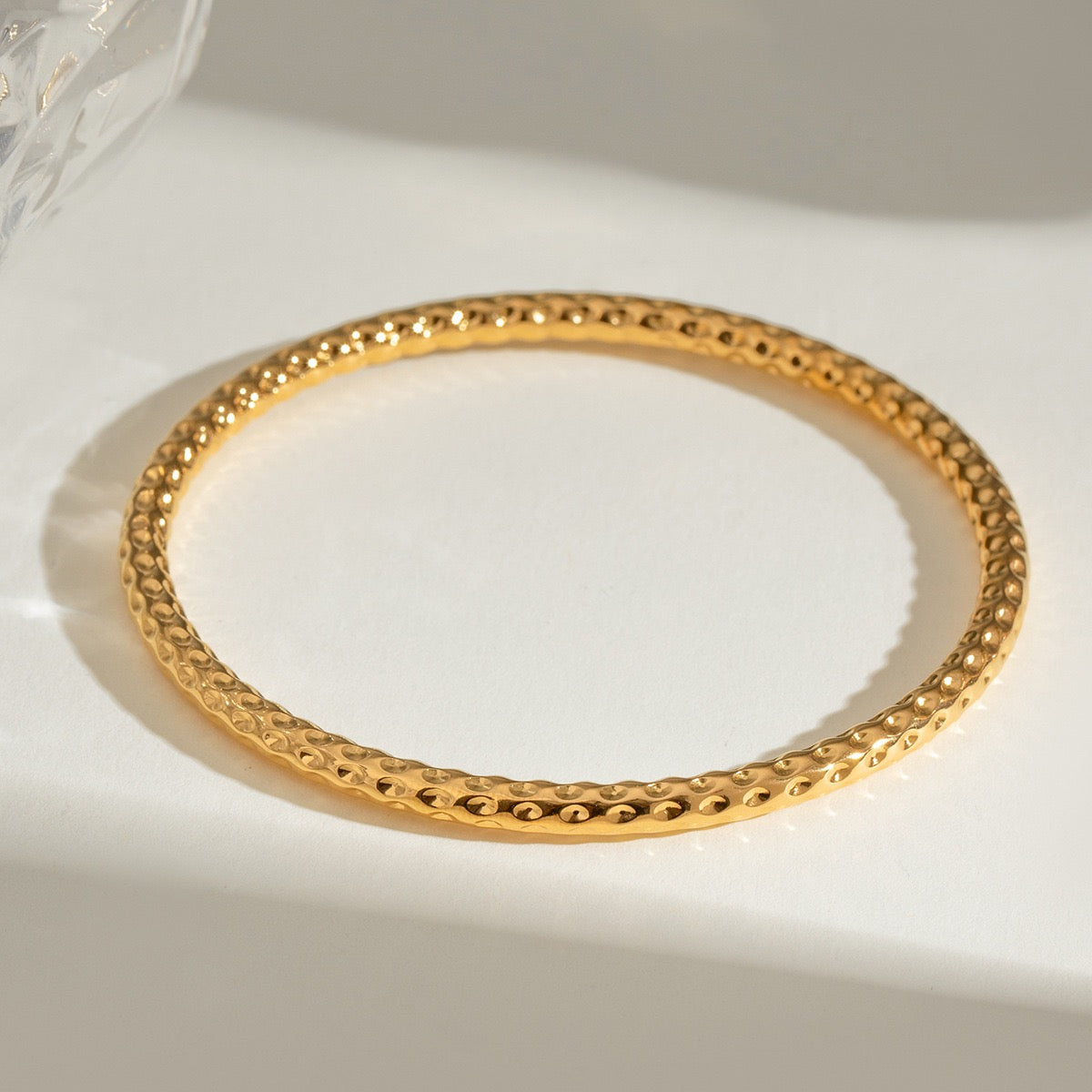 Hammer hoop bangle