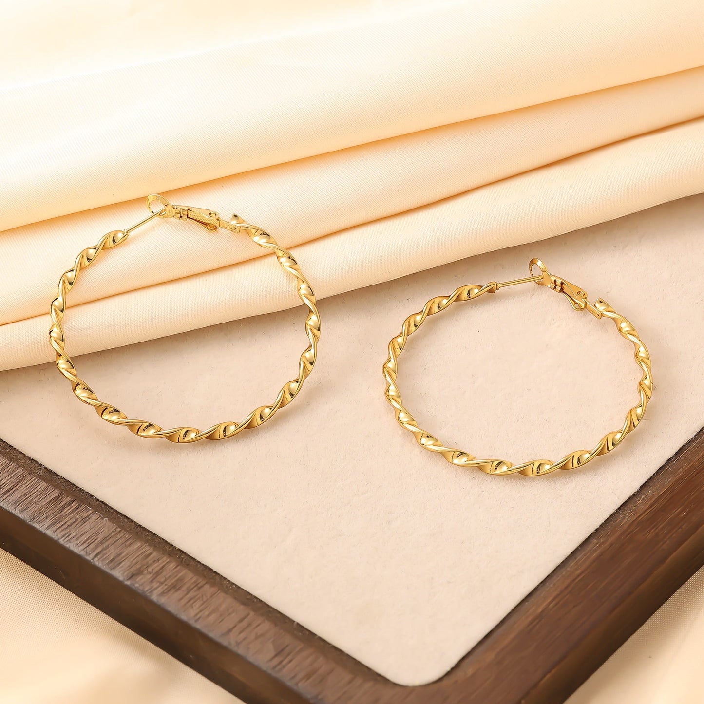 Brad twisted hoops earrings