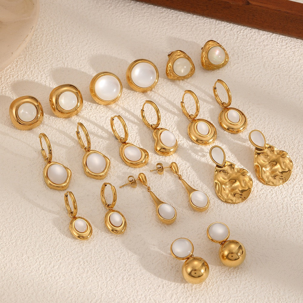 White sand hoop earrings