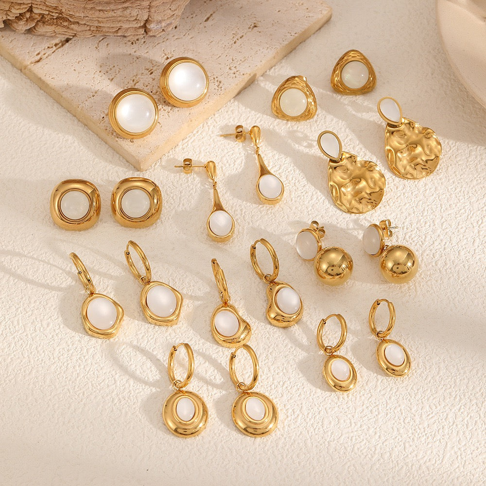 White sand hoop earrings