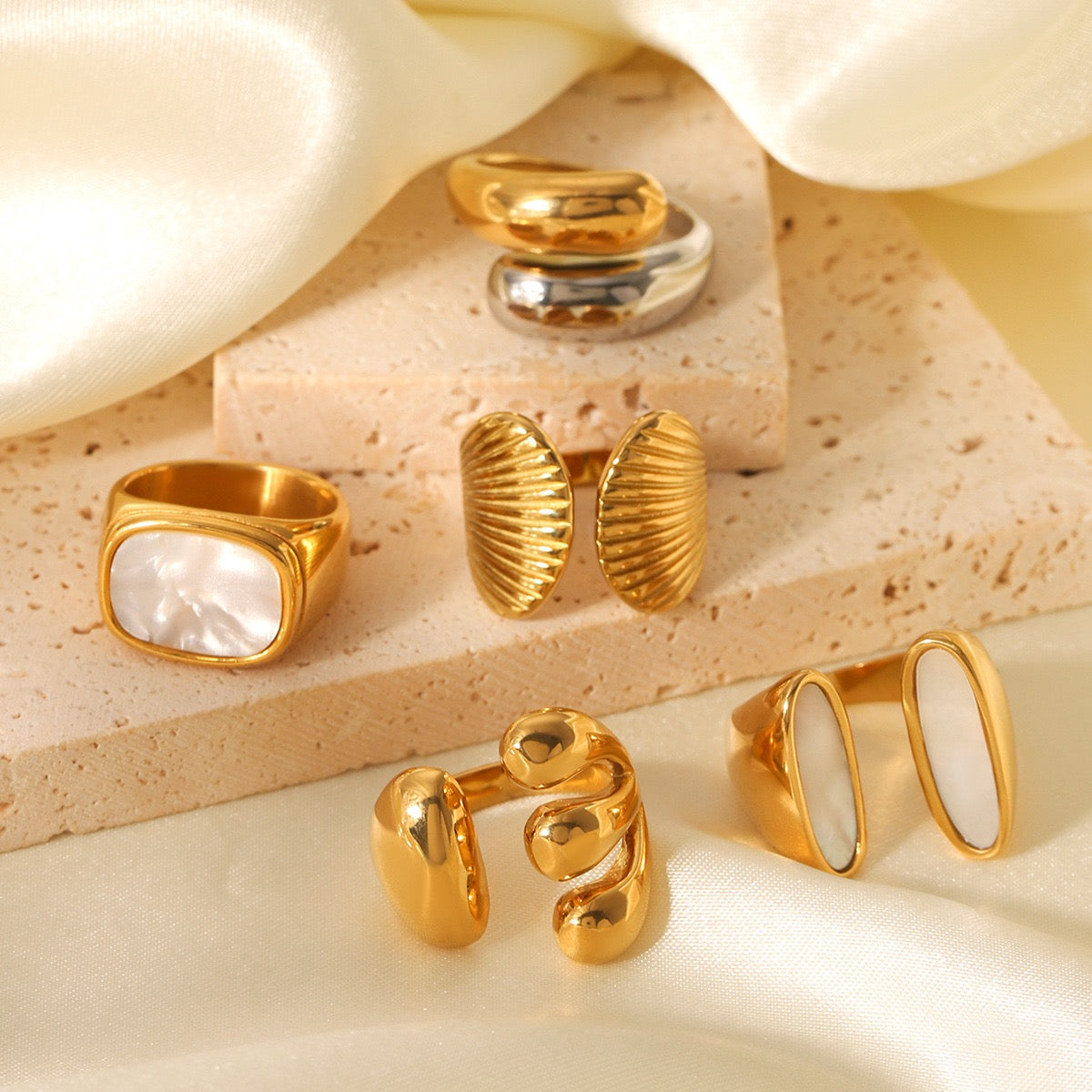 White mother of pearl statement rings