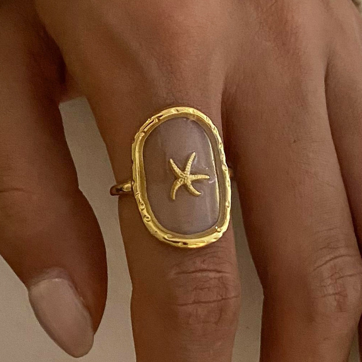 Gold starfish ring