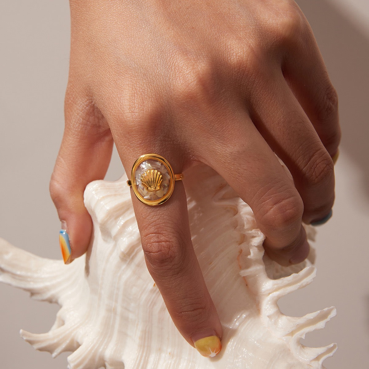 Golden shell ring