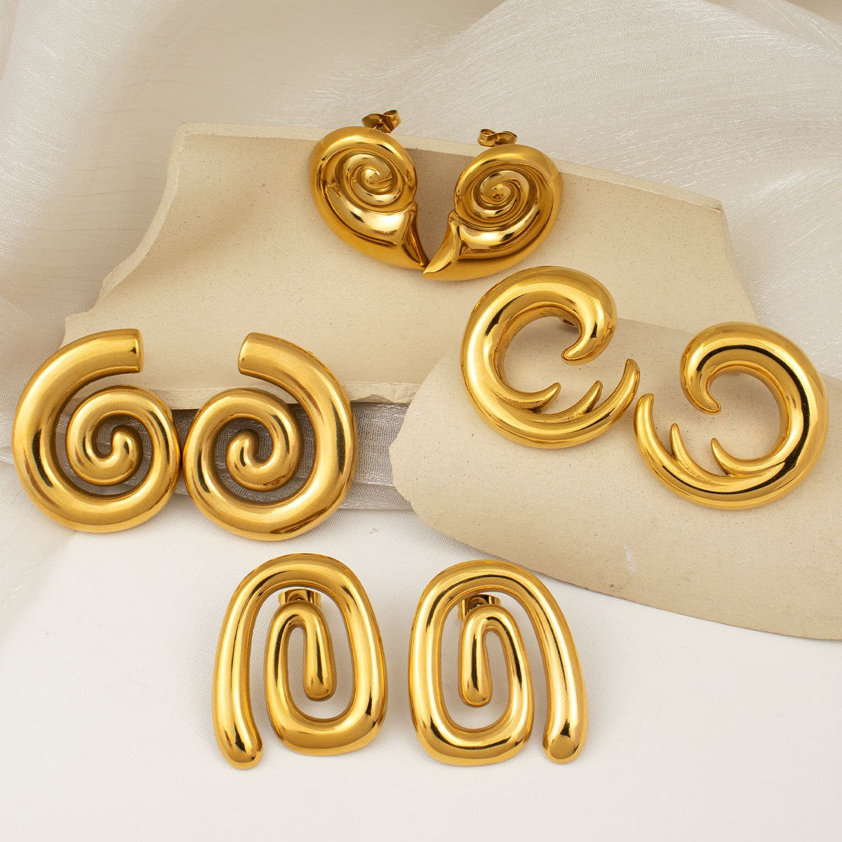Butimo swirl earrings