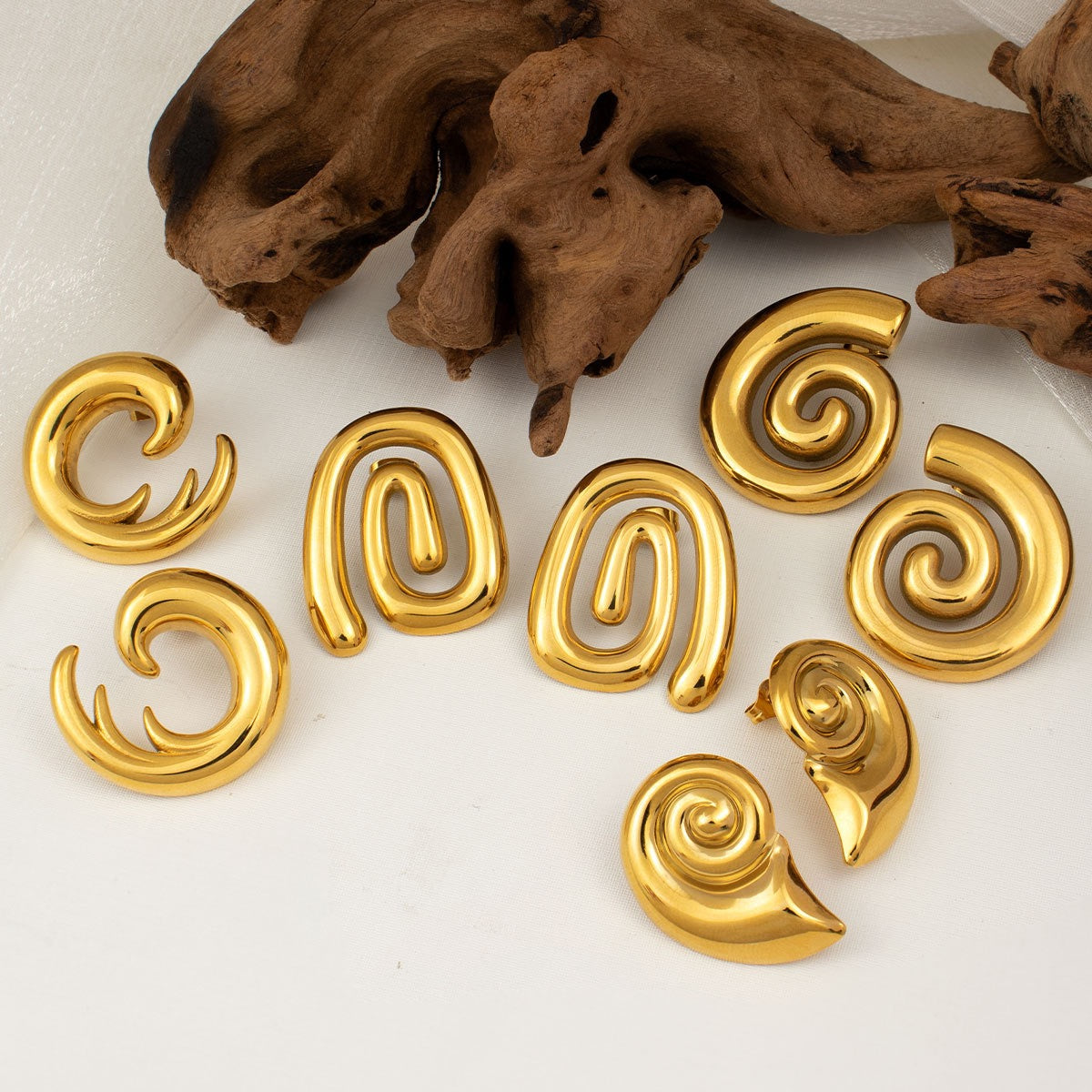 Butimo swirl earrings