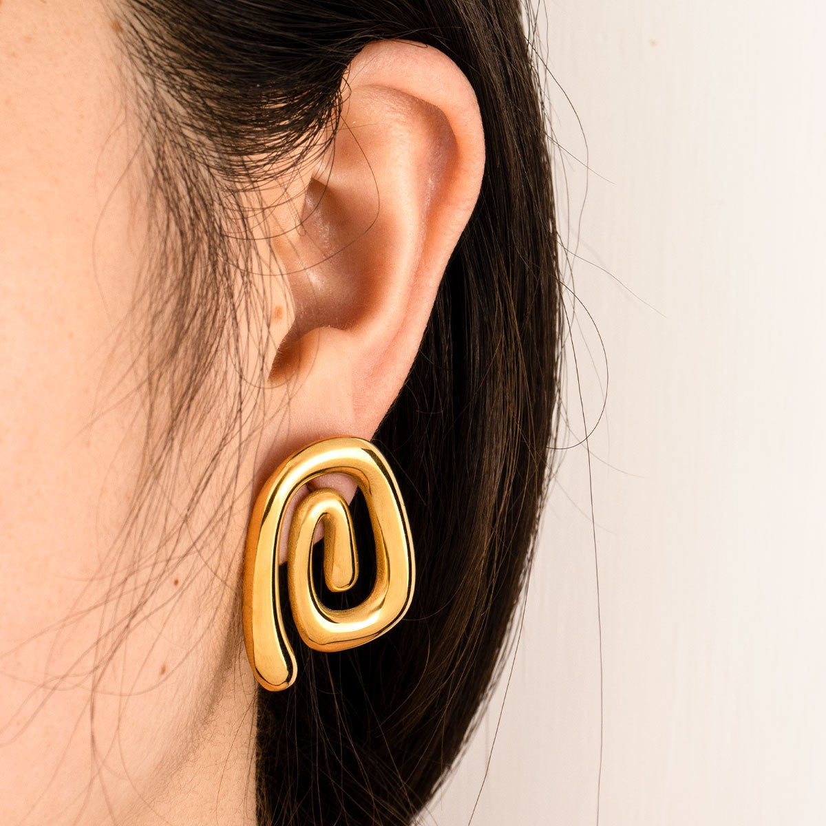 Butimo swirl earrings