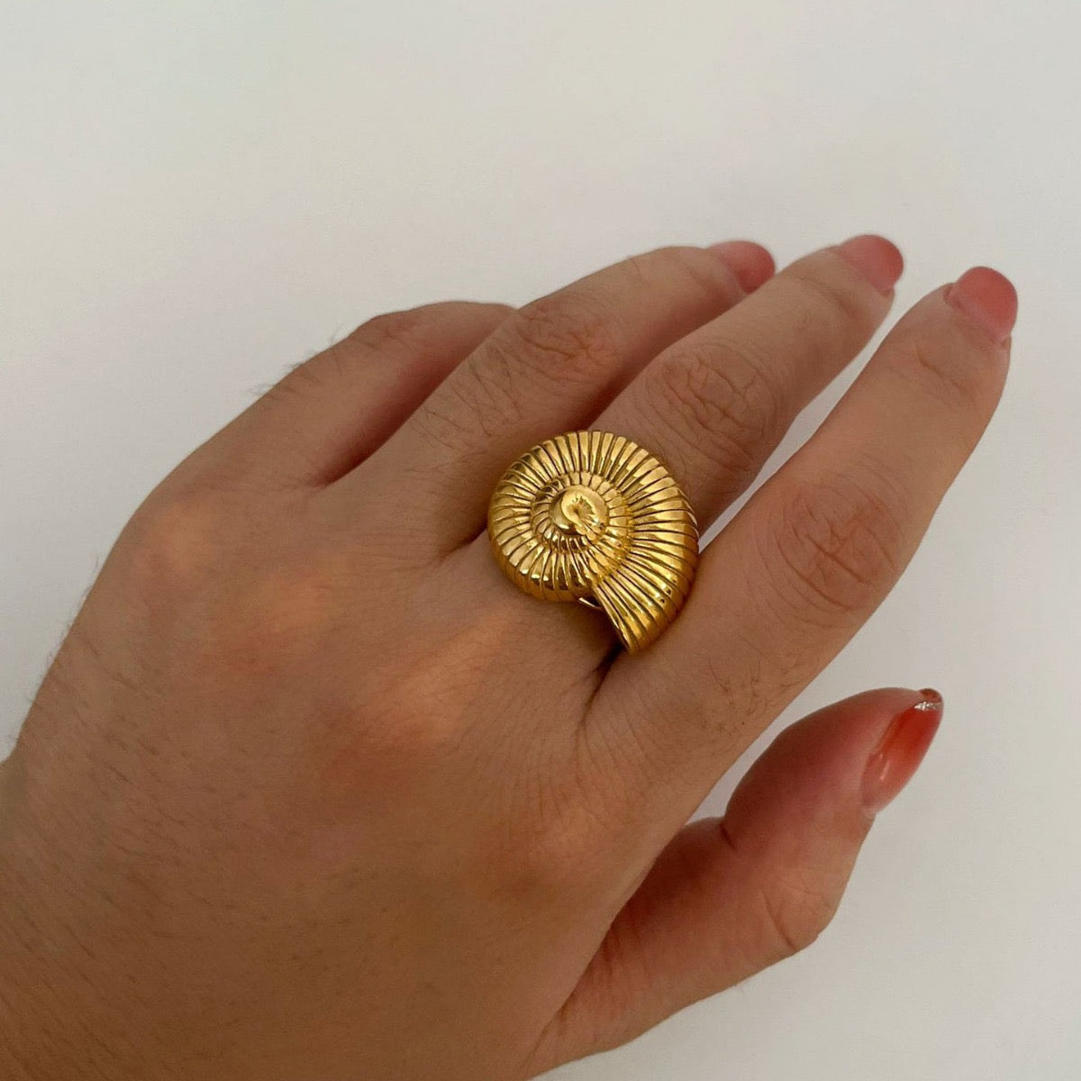 Golden snail ring