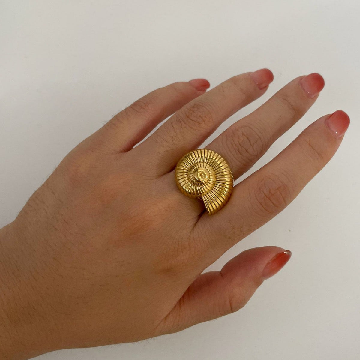 Golden snail ring