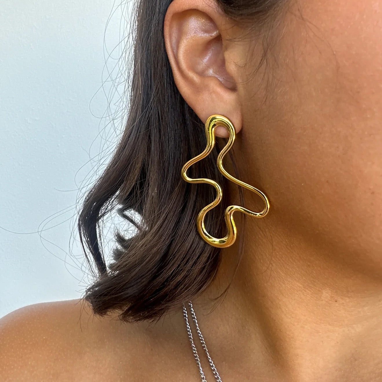 Melting lines earrings