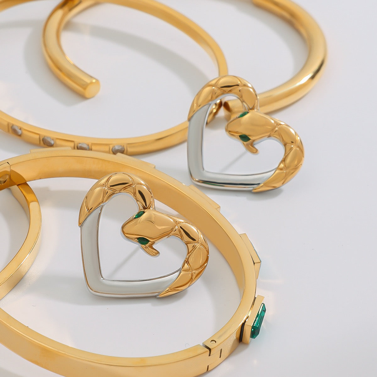 Snake heart earrings