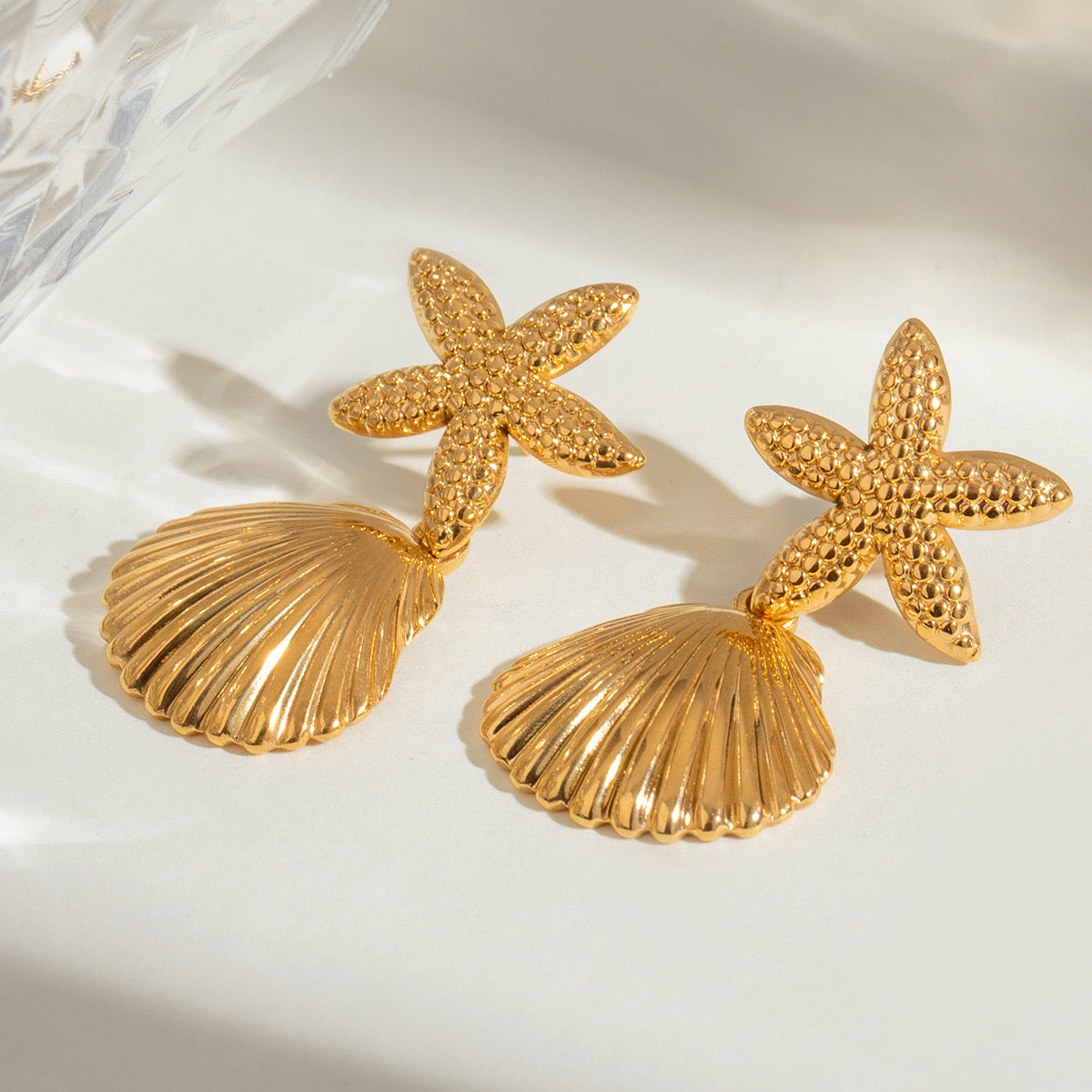 Cylina Bondi star shell earrings