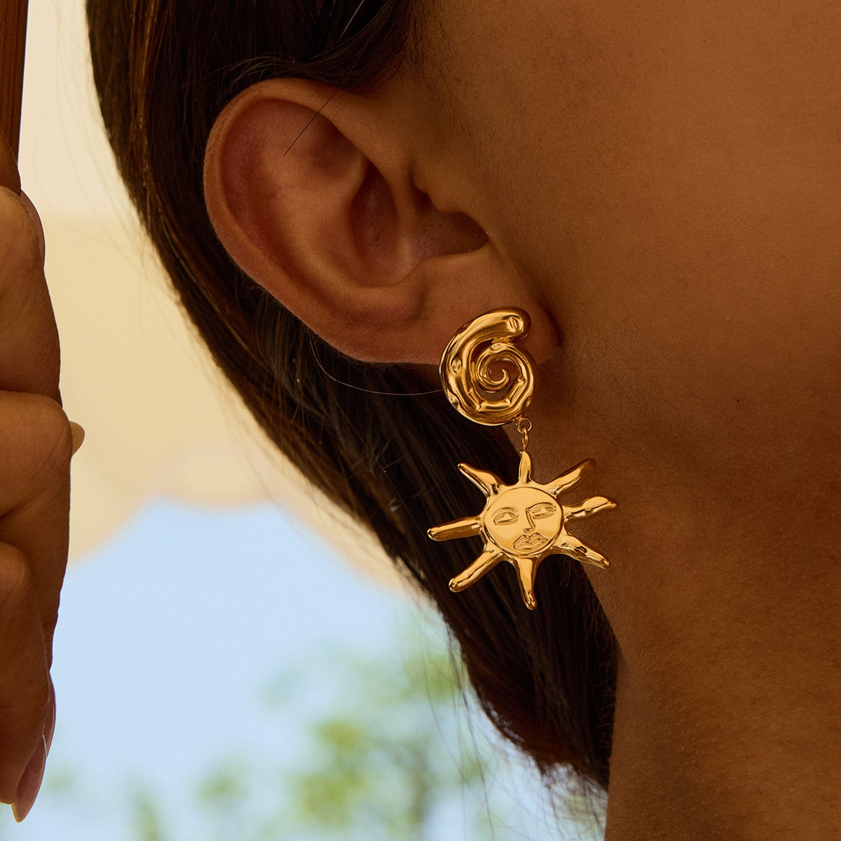 Swirl sun earrings