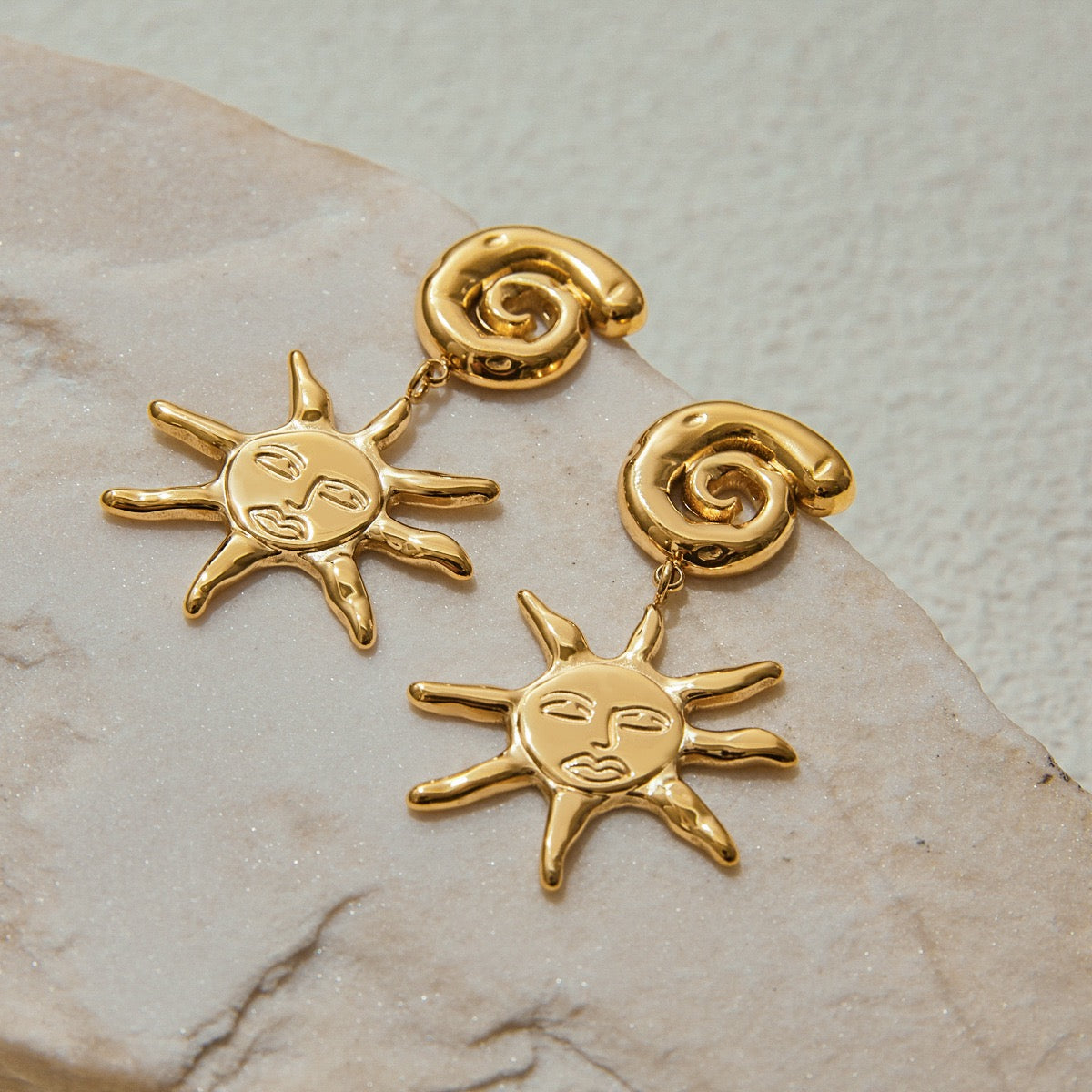 Swirl sun earrings
