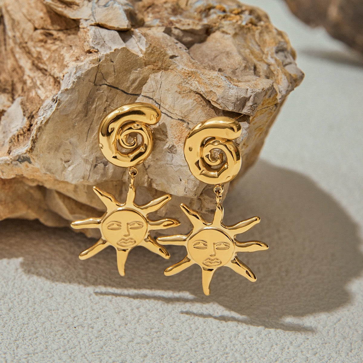 Swirl sun earrings