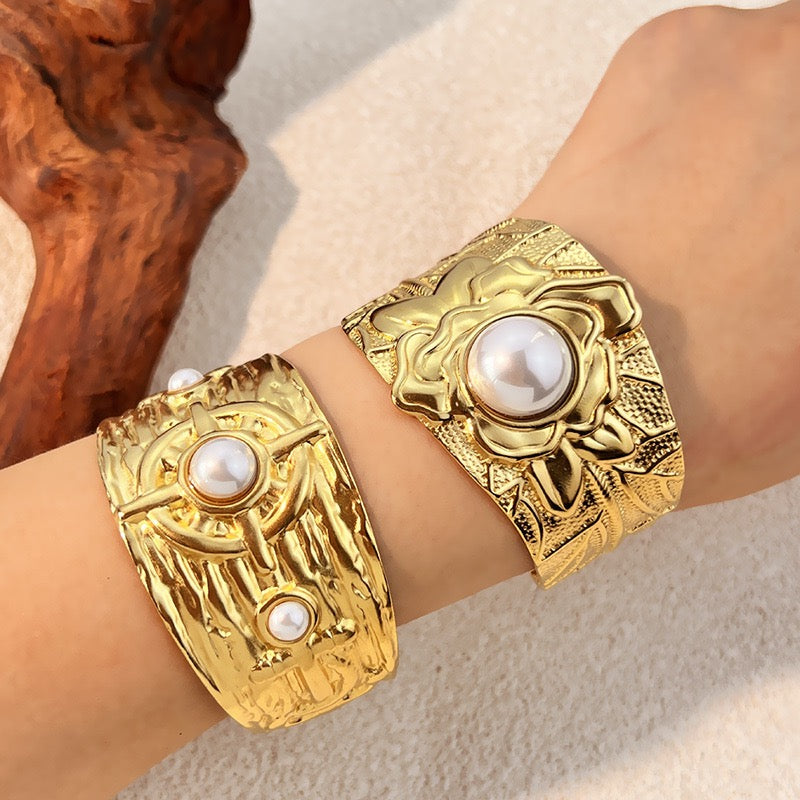 Pearly statement bangles