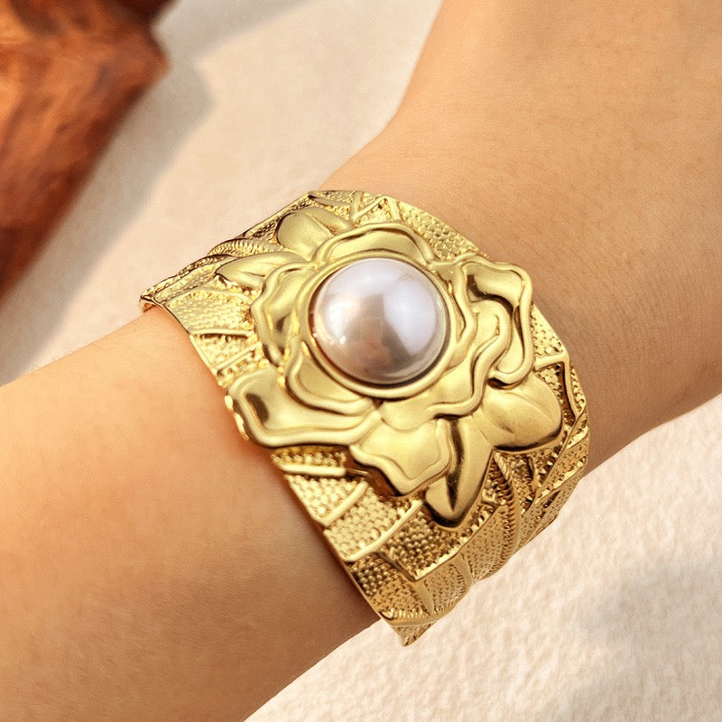 Pearly statement bangles