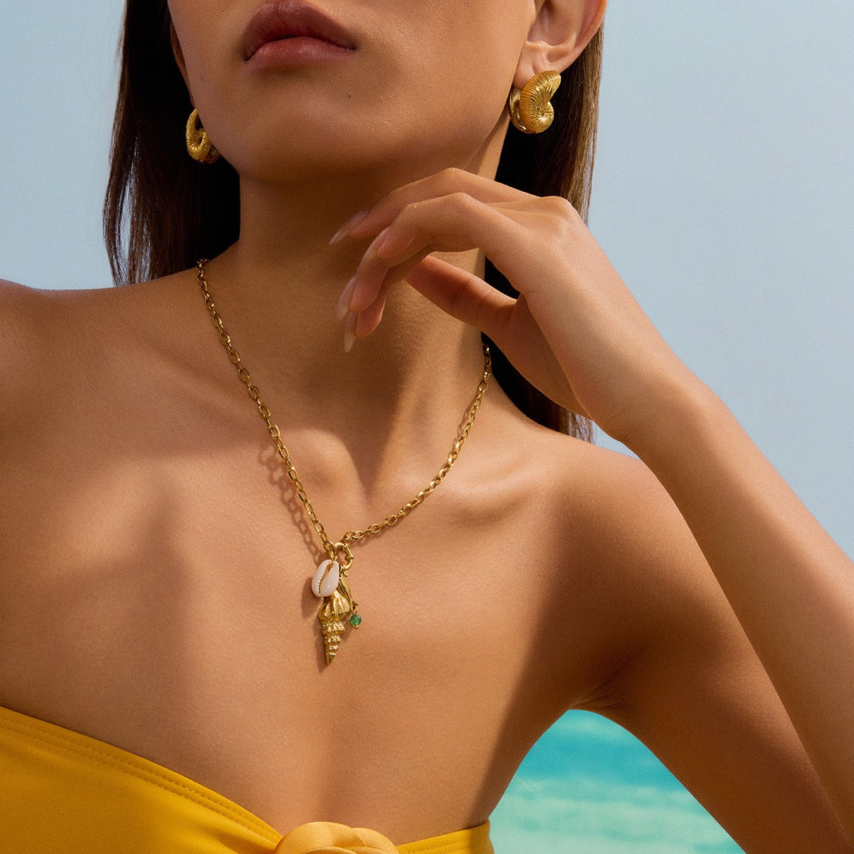 Sea snail fish necklace