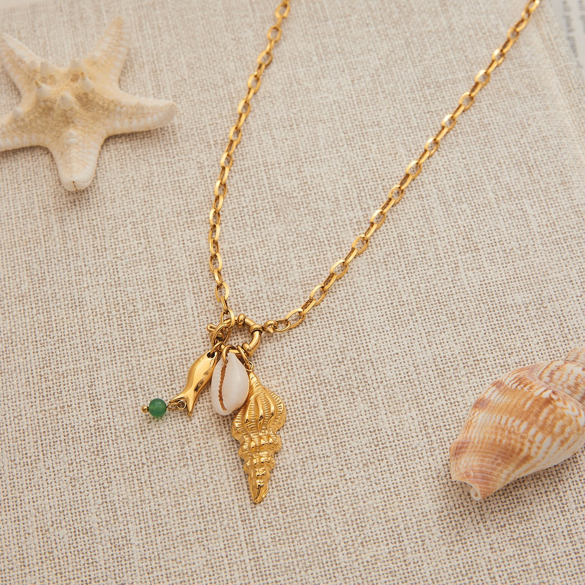 Sea snail fish necklace