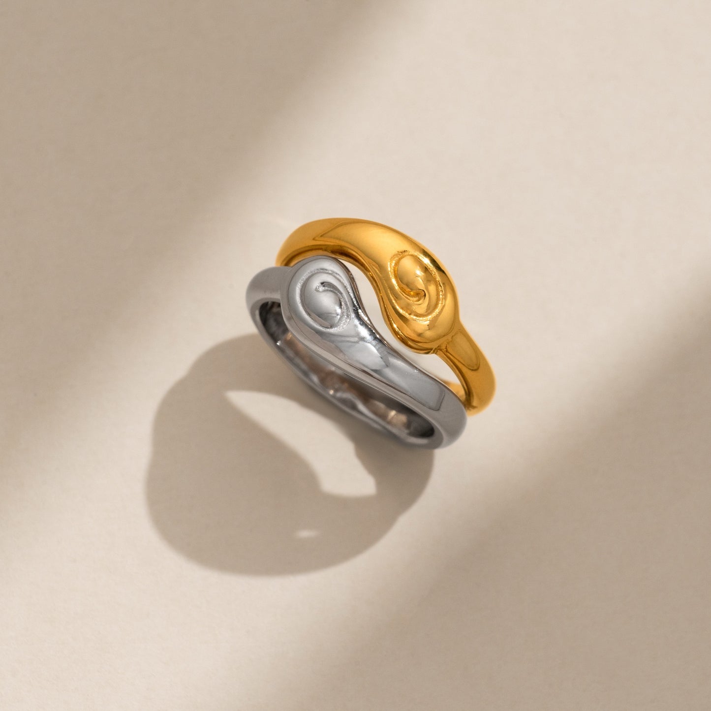 Agape Swirl couple of rings