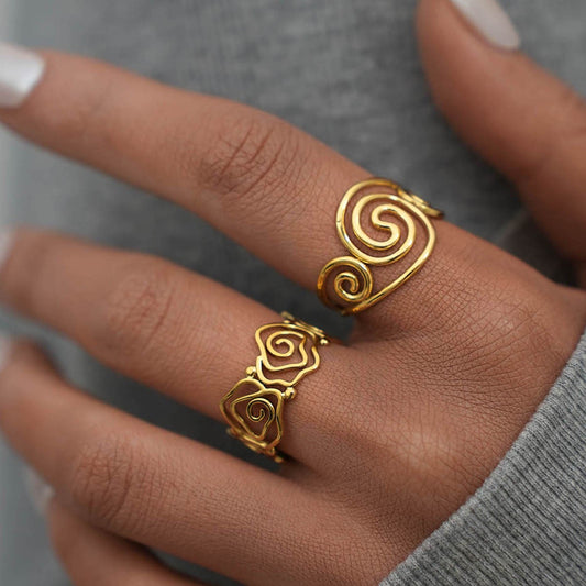 Haji Lines swirl rose rings
