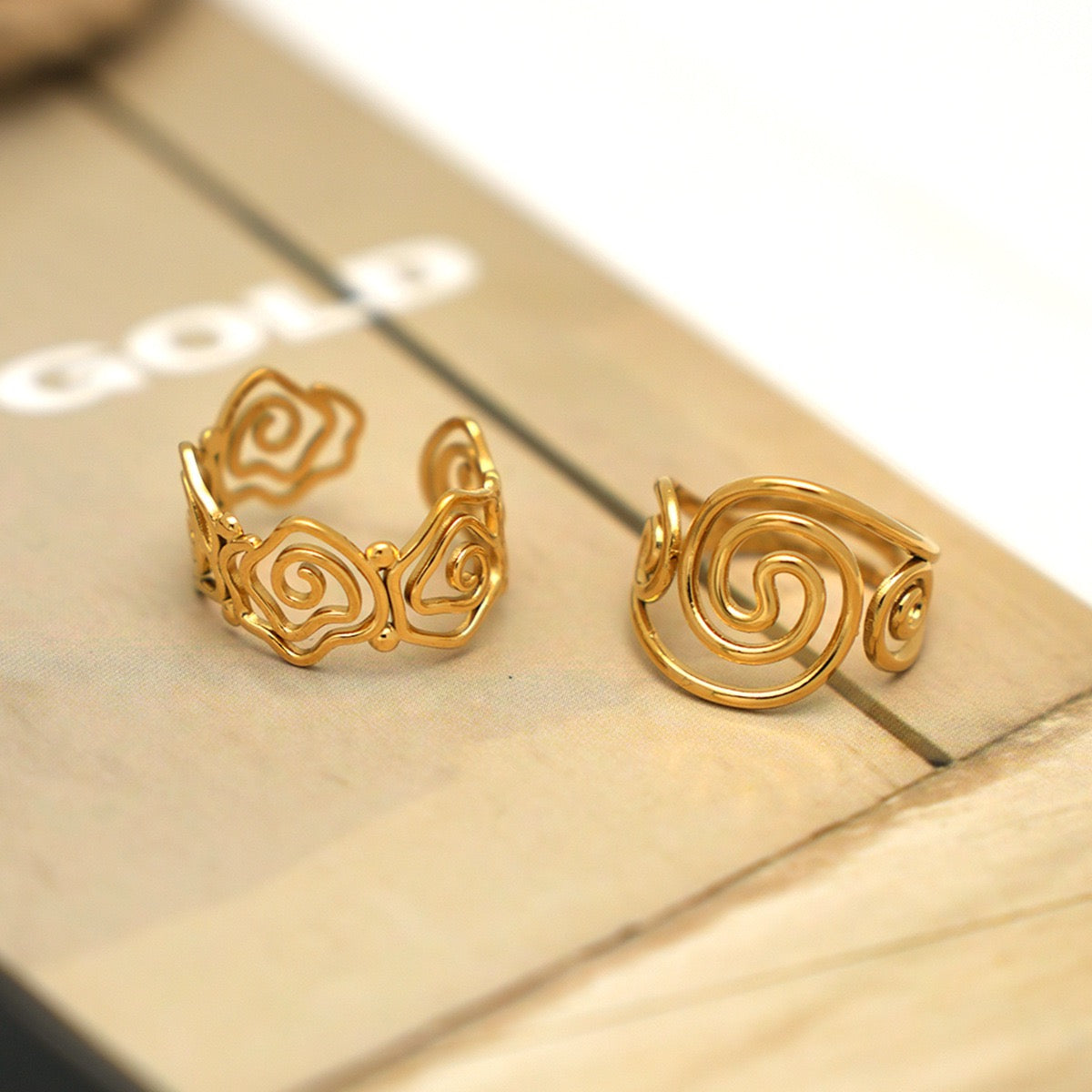 Haji Lines swirl rose rings