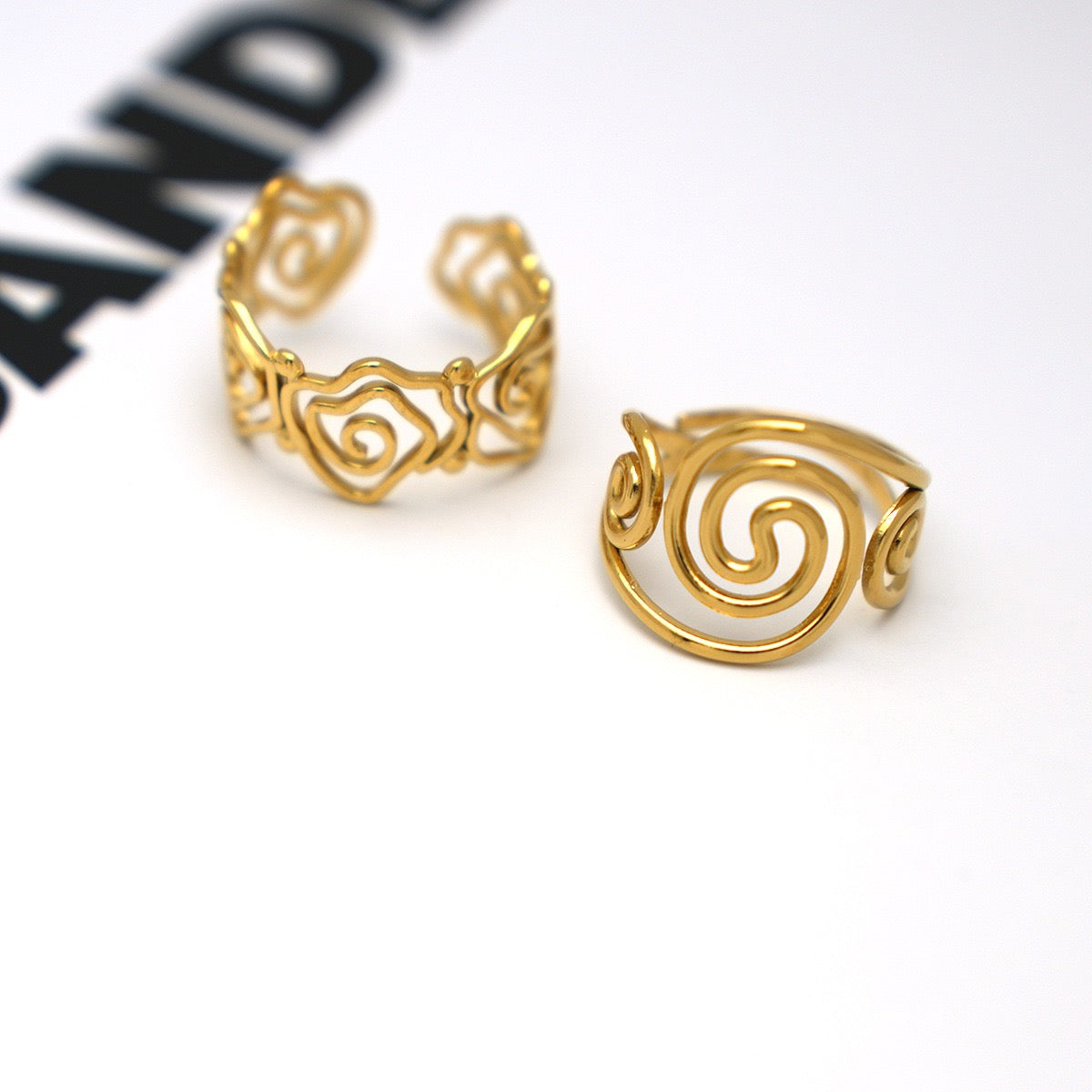 Haji Lines swirl rose rings