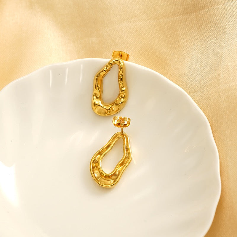 Melting lines earrings