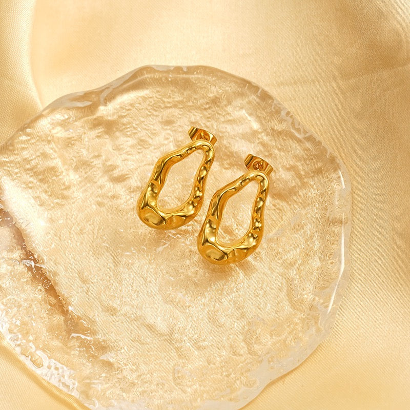 Melting lines earrings