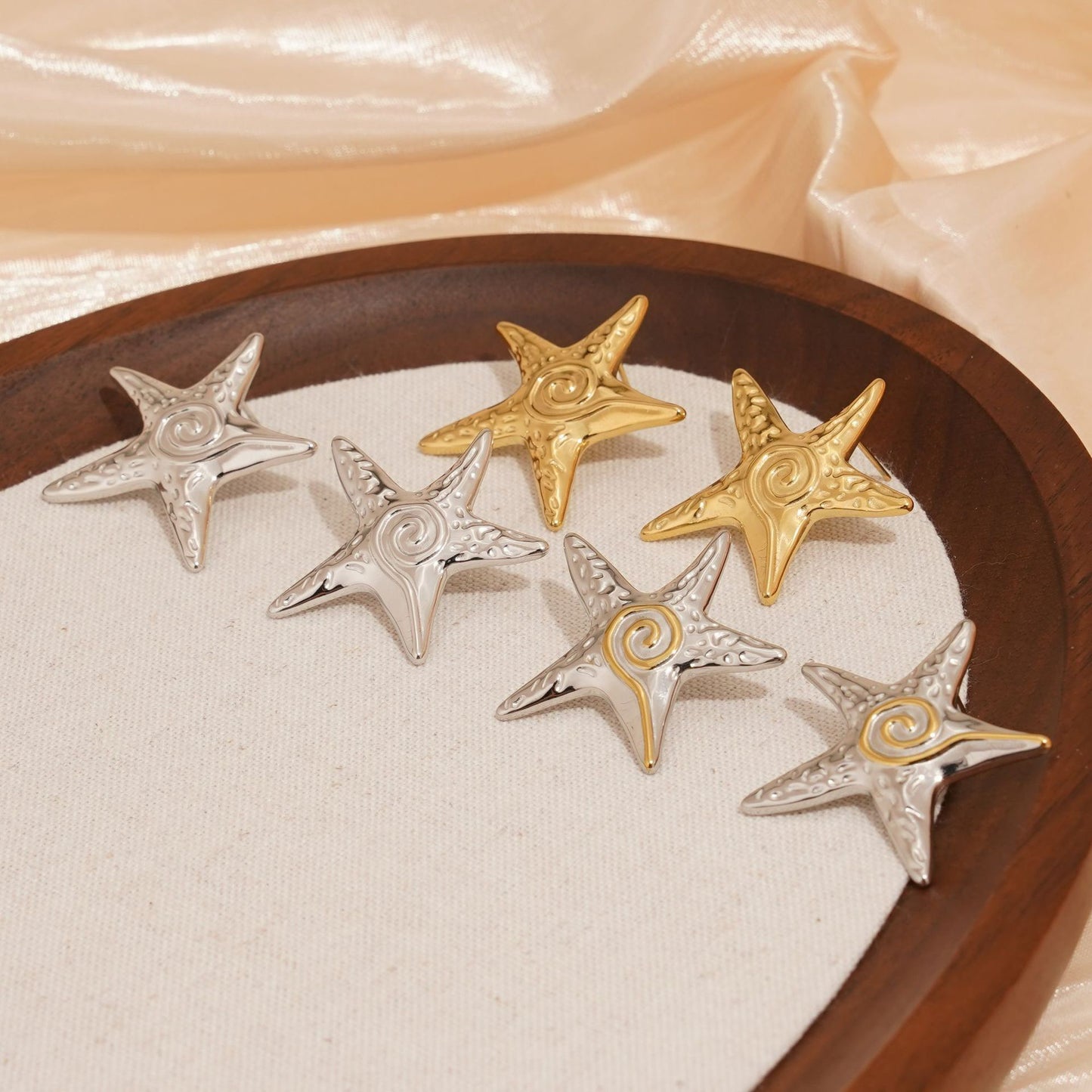 Tarako Swirl starfish earrings