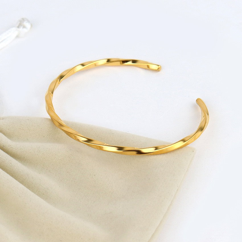 Thin twirl twist bangle