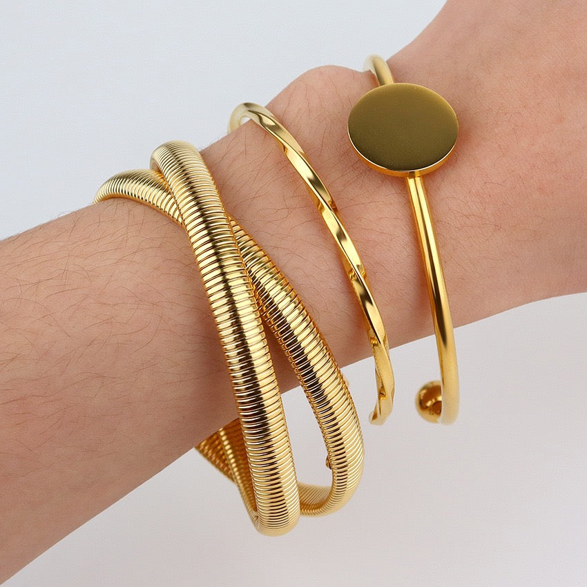 Thin twirl twist bangle