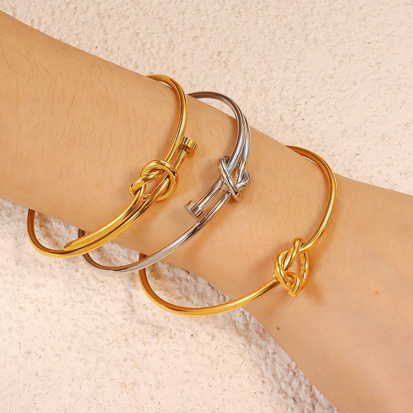 Tangled nail bangle