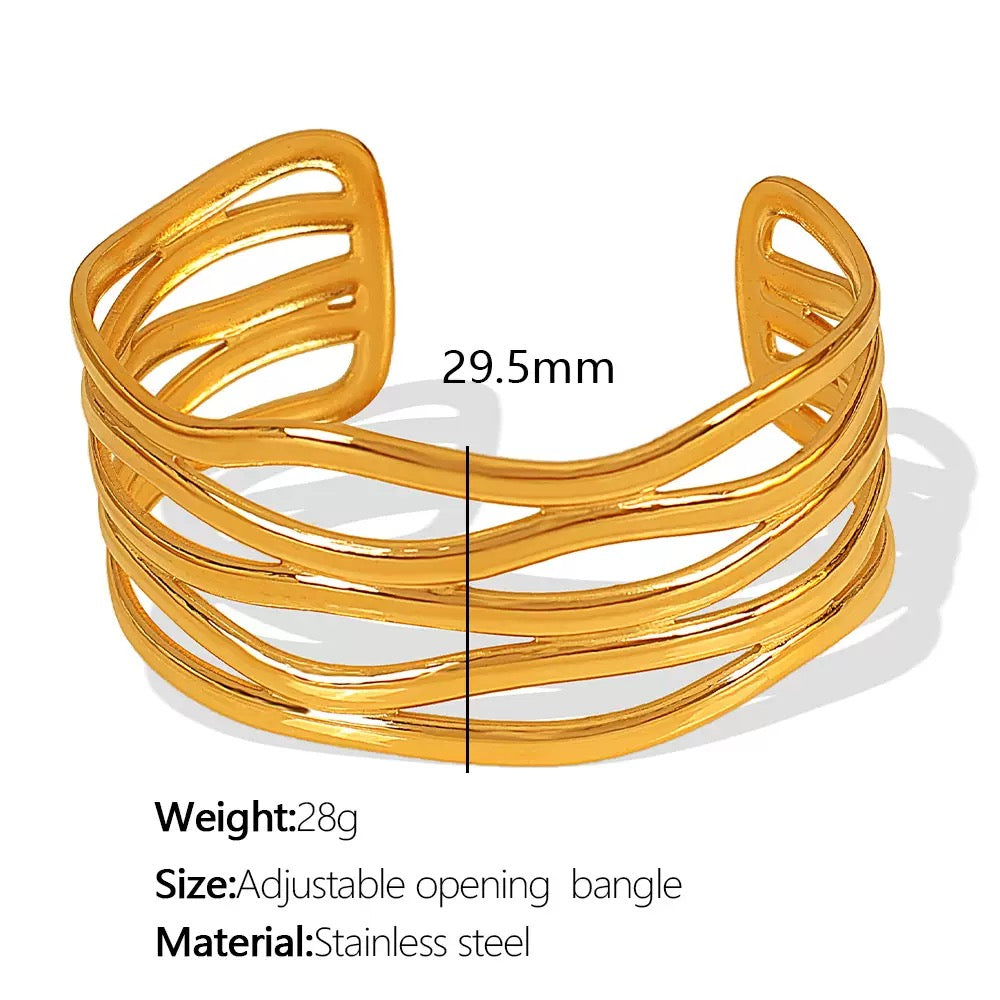 Layer statement bangle