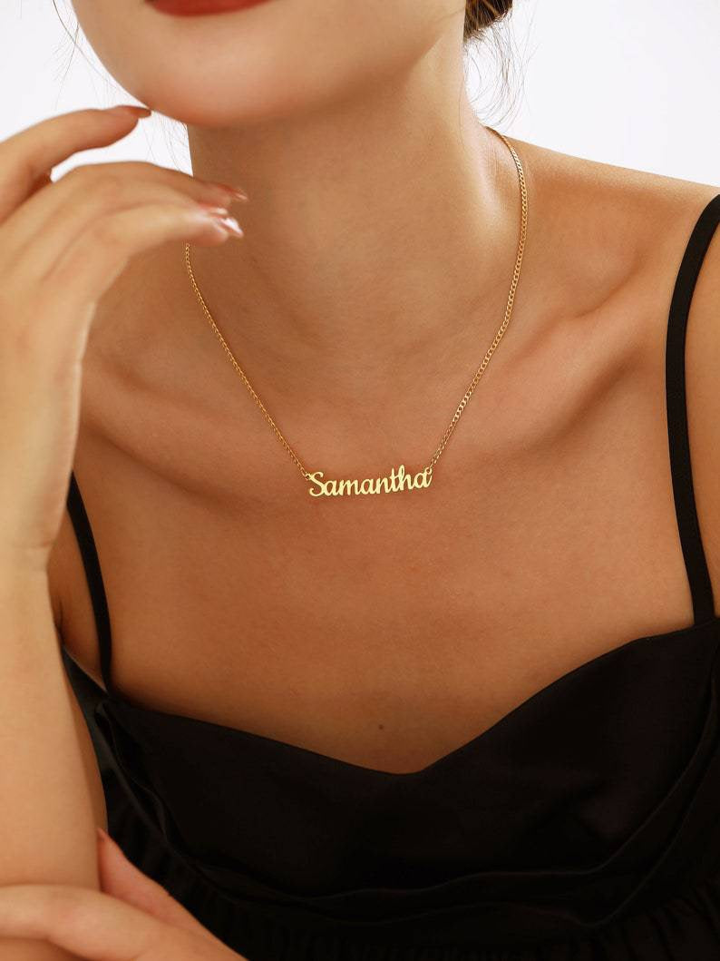 A customized name necklace stainless steel with gold plating