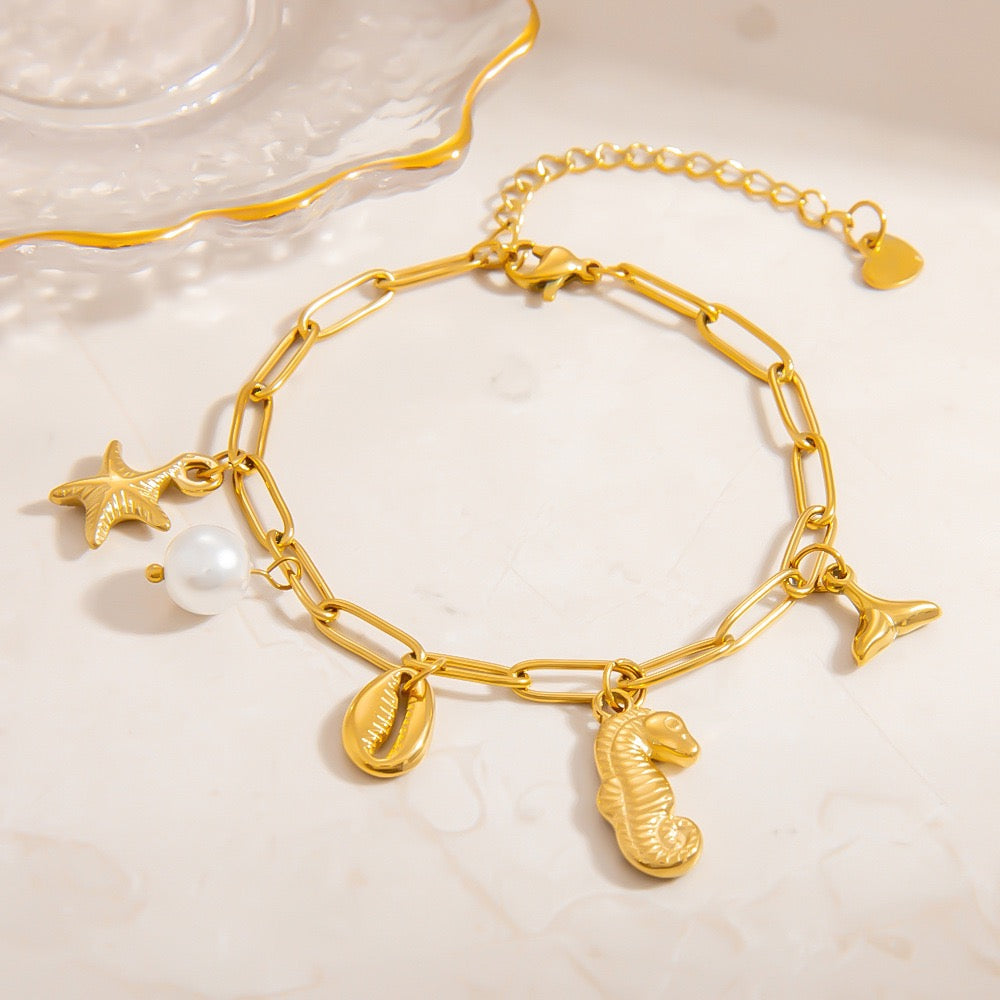 Seahorse charm shell bracelet
