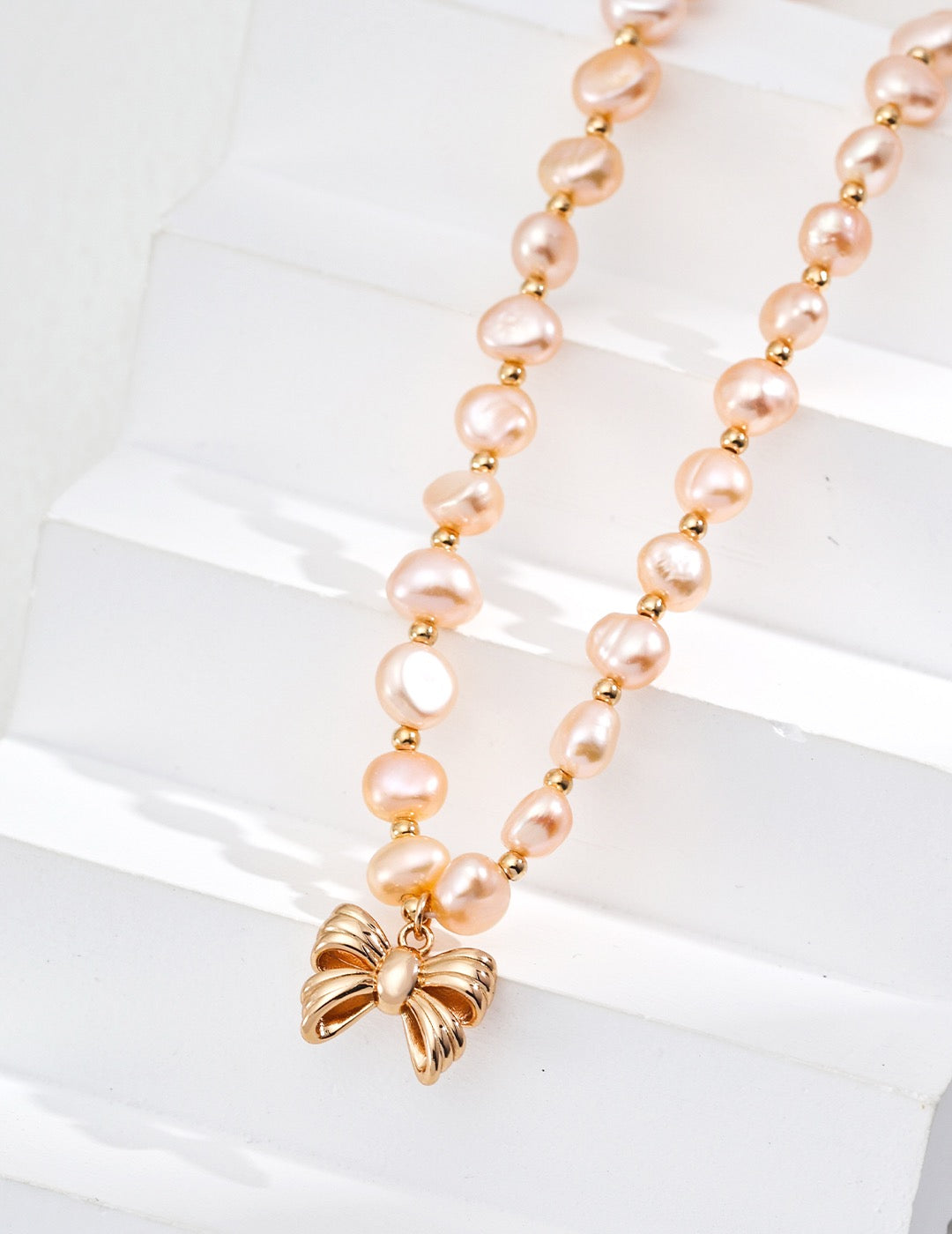 Champagne pearls bow necklace